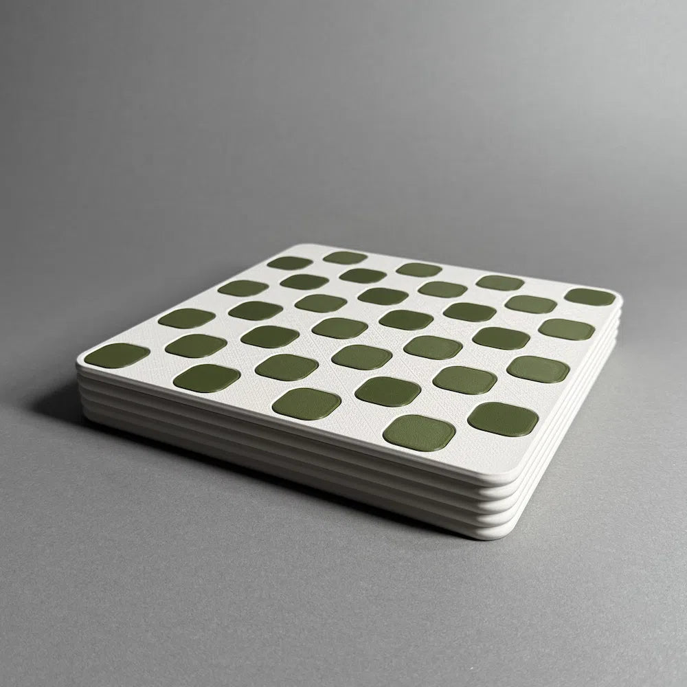 A view of a 3d printed green and white chess board