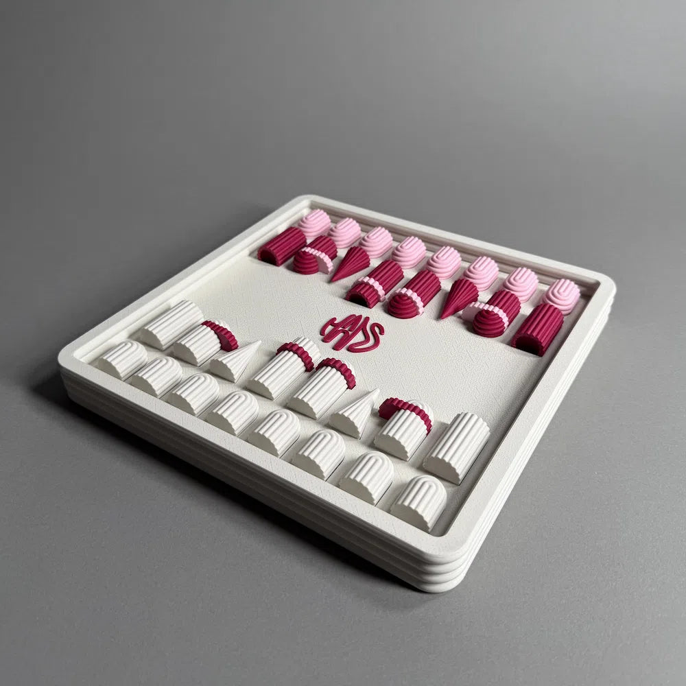 a 3d printed pink and white chess box
